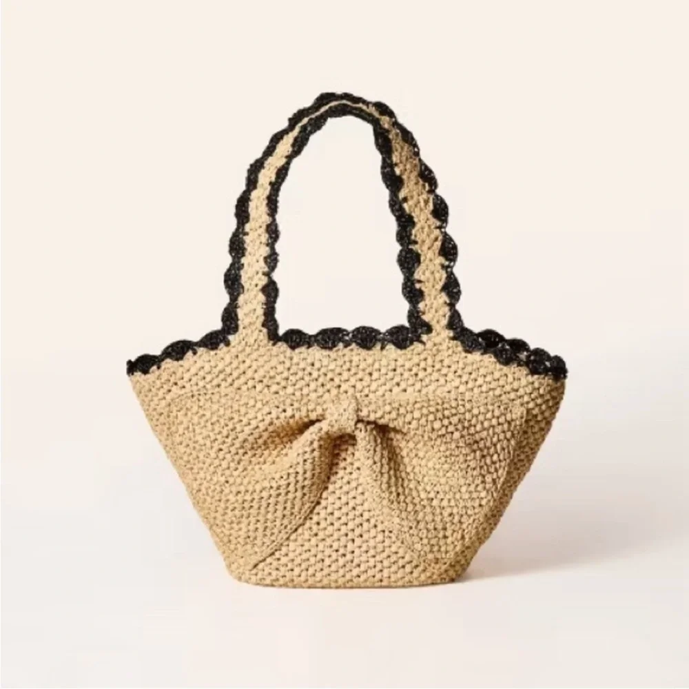 kate spade straw tote with black trim
